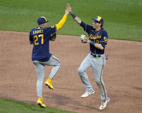 Burnes takes perfect game into the sixth, Yelich homers as Brewers hold off Pirates 11-8